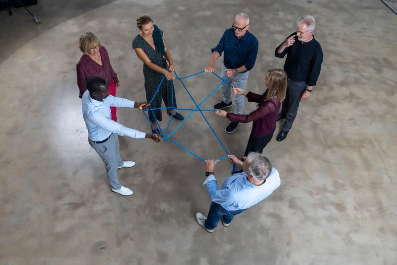 Gruppe beim Coaching von oben